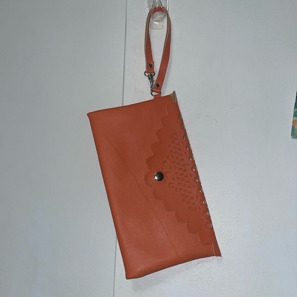 Saks Fifth Avenue Handbags - 🛑Giveaway 🛑 Orange Saks Fifth Ave Wristlet🛑 NOT for Sale